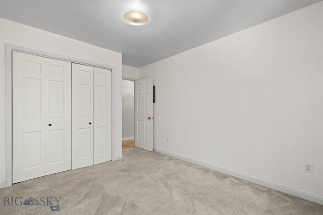 2020 S Rouse Unit 7, Bozeman, MT 59715 - unfurnished bedroom featuring carpet floors and a closet