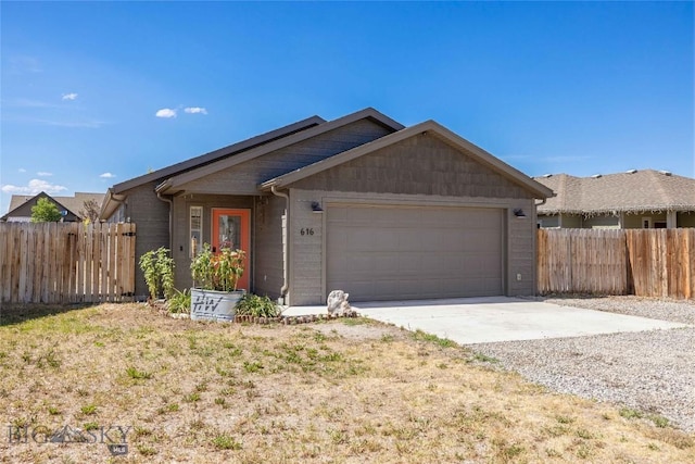 616 W Adams St, Three Forks, MT 59752 - ranch-style home featuring an attached garage and concrete driveway