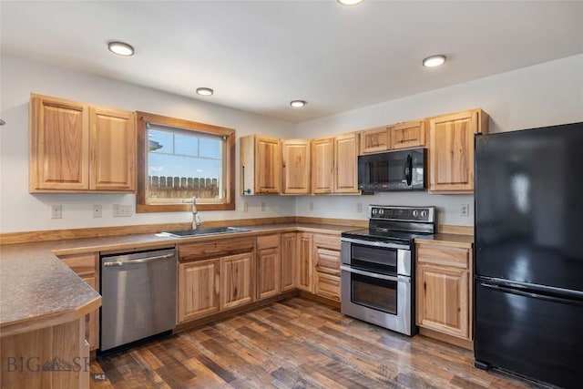 616 W Adams St, Three Forks, MT 59752 - kitchen featuring black appliances, light brown cabinets, dark wood finished floors, and recessed lighting