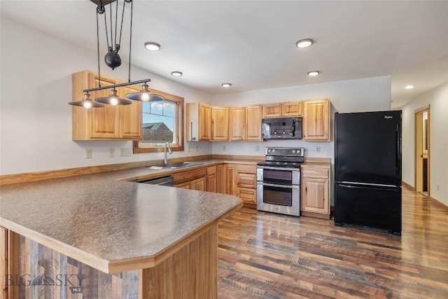 616 W Adams St, Three Forks, MT 59752 - kitchen with black appliances, a peninsula, light brown cabinets, dark wood finished floors, and recessed lighting