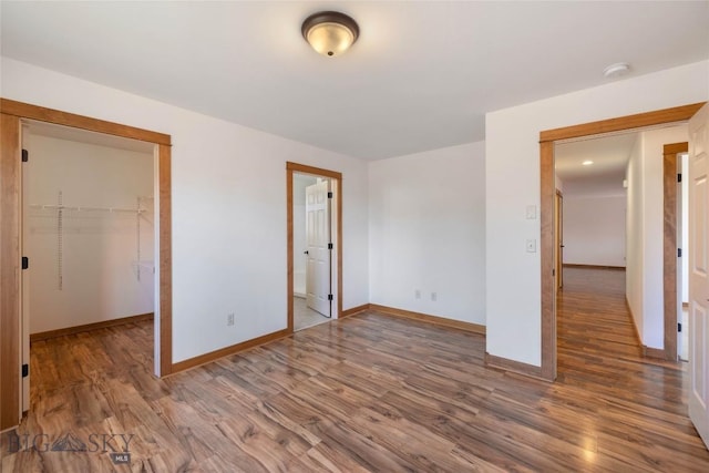 616 W Adams St, Three Forks, MT 59752 - unfurnished room featuring wood finished floors and a smoke detector