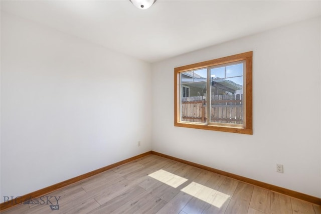 616 W Adams St, Three Forks, MT 59752 - unfurnished room with baseboards and light wood-style floors