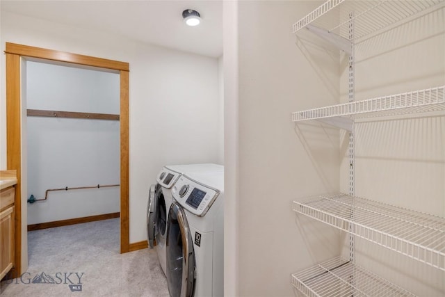 616 W Adams St, Three Forks, MT 59752 - laundry area with washer and clothes dryer and light carpet