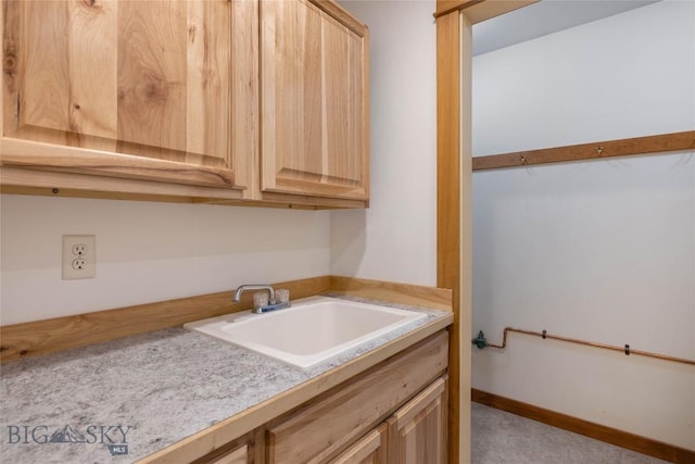 616 W Adams St, Three Forks, MT 59752 - laundry area with a sink