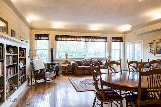 300 Holmes, Butte, MT 59701 - dining room with plenty of natural light, ornamental molding, wood finished floors, french doors, and a textured ceiling