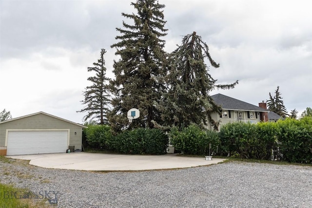 300 Holmes, Butte, MT 59701 - view of side of property with an outdoor structure and a detached garage
