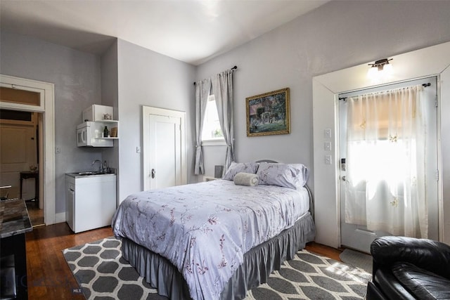 300 Holmes, Butte, MT 59701 - bedroom featuring dark wood-style flooring