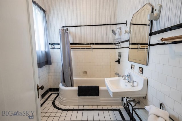 300 Holmes, Butte, MT 59701 - full bathroom featuring tile walls, shower / tub combo, and wallpapered walls