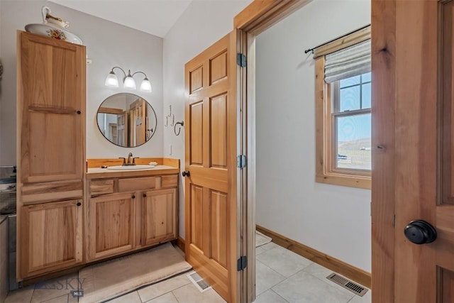 219 Rolling Glen Ranch Loop, Three Forks, MT 59752 - bathroom with tile patterned floors and vanity