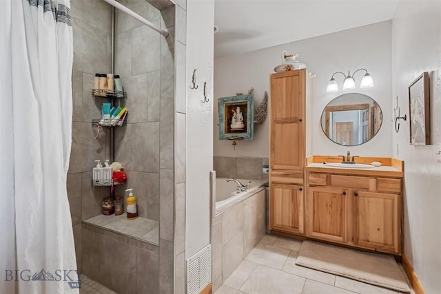 219 Rolling Glen Ranch Loop, Three Forks, MT 59752 - full bath with tiled shower, a bath, tile patterned floors, and vanity