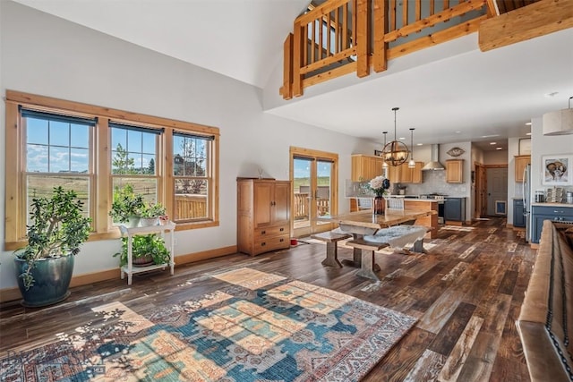 219 Rolling Glen Ranch Loop, Three Forks, MT 59752 - living area featuring dark wood finished floors, a chandelier, a high ceiling, and recessed lighting