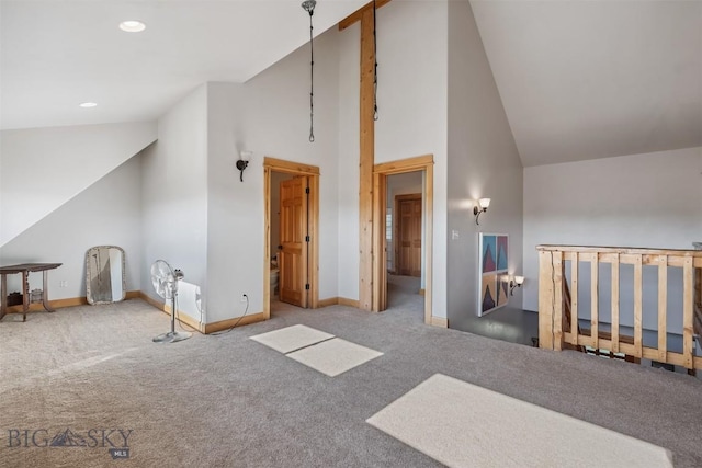 219 Rolling Glen Ranch Loop, Three Forks, MT 59752 - additional living space with carpet flooring, high vaulted ceiling, and recessed lighting