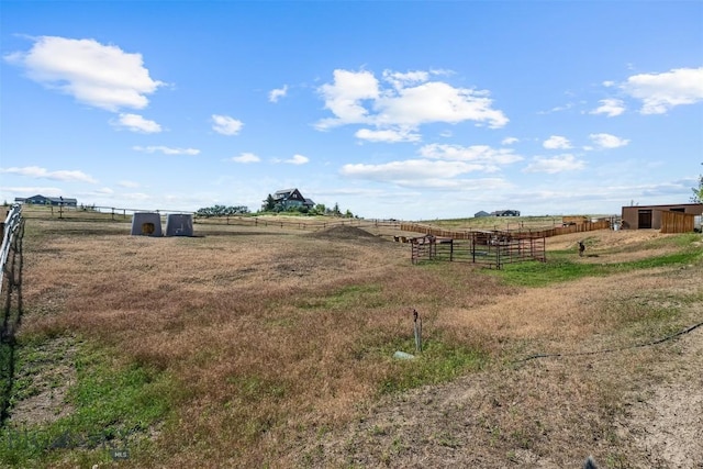 219 Rolling Glen Ranch Loop, Three Forks, MT 59752 - view of yard featuring a rural view and an outdoor structure