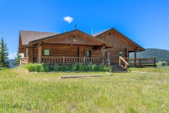 3500 Jackson Creek Rd, Bozeman, MT 59715 - view of front of property with log exterior and a porch