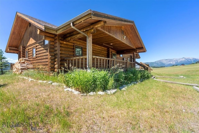 3500 Jackson Creek Rd, Bozeman, MT 59715 - view of side of home with log exterior and a mountain view