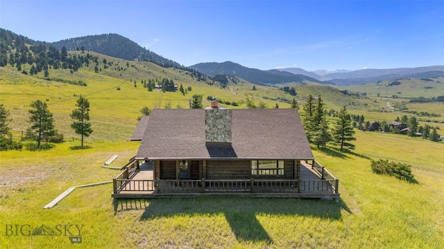 3500 Jackson Creek Rd, Bozeman, MT 59715 - view of front of home featuring a mountain view, a view of countryside, and a chimney