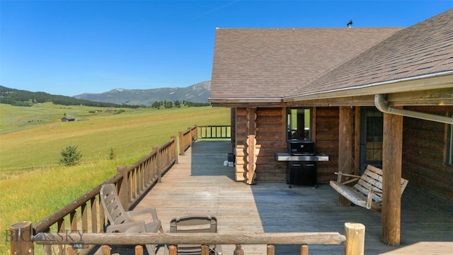 3500 Jackson Creek Rd, Bozeman, MT 59715 - wooden terrace featuring a mountain view and a view of rural / pastoral area