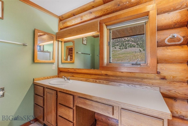 3500 Jackson Creek Rd, Bozeman, MT 59715 - bathroom featuring rustic walls and vanity