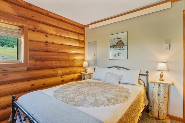 3500 Jackson Creek Rd, Bozeman, MT 59715 - bedroom with log walls and carpet flooring