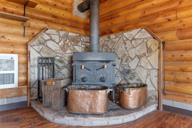 3500 Jackson Creek Rd, Bozeman, MT 59715 - detailed view of a wood stove, wood finished floors, and heating unit