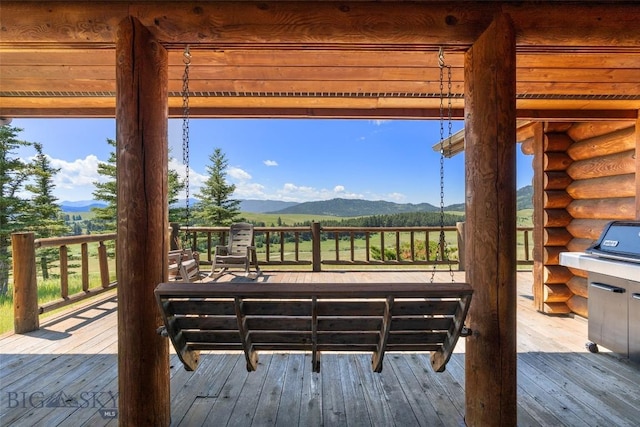 3500 Jackson Creek Rd, Bozeman, MT 59715 - wooden deck featuring a mountain view and area for grilling