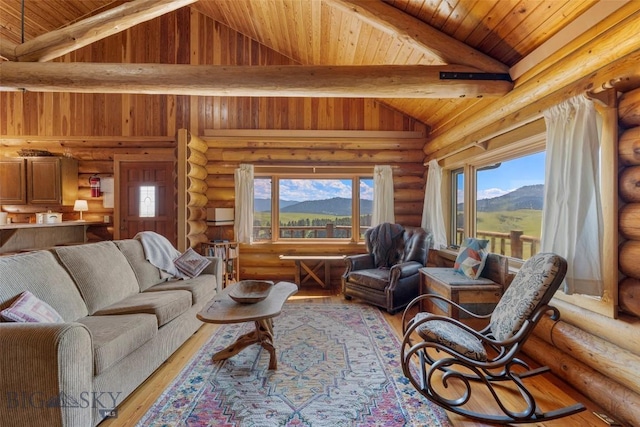 3500 Jackson Creek Rd, Bozeman, MT 59715 - living area with a mountain view, light wood finished floors, wooden ceiling, and log walls