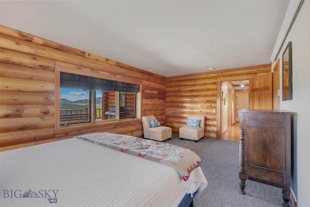 3500 Jackson Creek Rd, Bozeman, MT 59715 - bedroom featuring carpet flooring and rustic walls