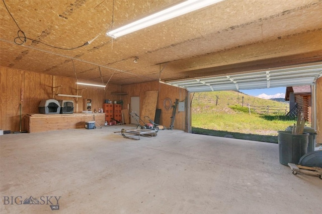 3500 Jackson Creek Rd, Bozeman, MT 59715 - garage featuring wood walls