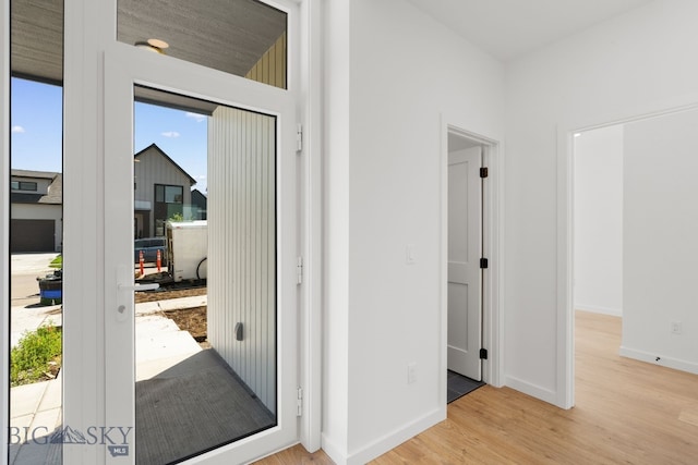 2809 S 30th Ave, Bozeman, MT 59718 - doorway to outside with light wood-style flooring and baseboards