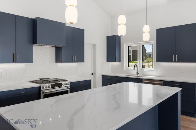 2809 S 30th Ave, Bozeman, MT 59718 - kitchen featuring stainless steel appliances, blue cabinetry, ventilation hood, tasteful backsplash, and a high ceiling