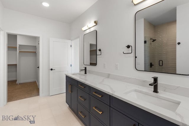 2809 S 30th Ave, Bozeman, MT 59718 - bathroom with a stall shower, double vanity, and a spacious closet