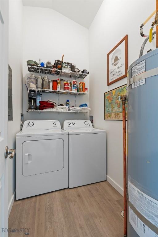 402 Brookline St Unit B, Livingston, MT 59047 - laundry room featuring water heater, independent washer and dryer, and wood finished floors