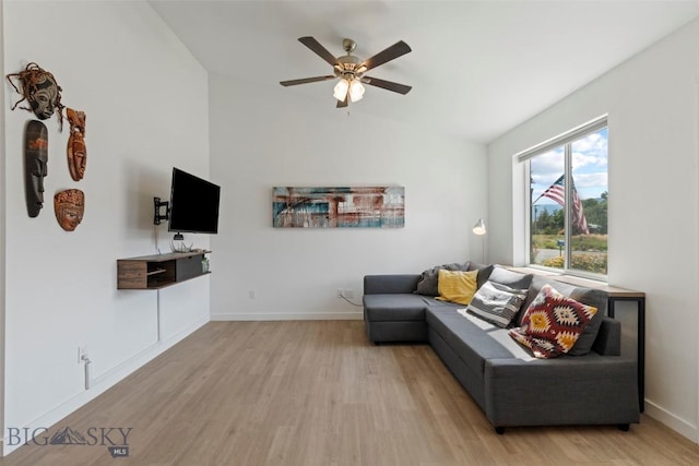 402 Brookline St Unit B, Livingston, MT 59047 - living area featuring vaulted ceiling, light wood-style floors, and ceiling fan