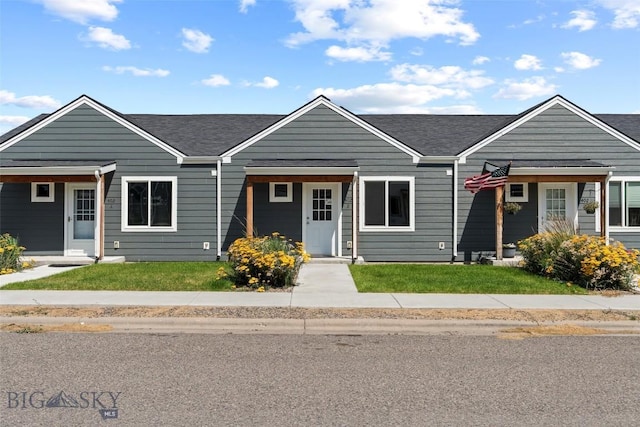 402 Brookline St Unit B, Livingston, MT 59047 - view of front of house with roof with shingles and a front yard