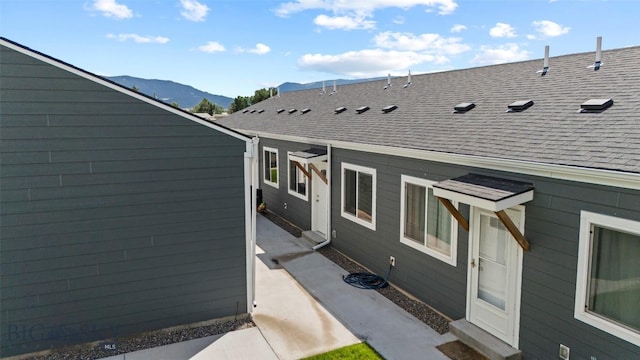 402 Brookline St Unit B, Livingston, MT 59047 - entrance to property featuring a shingled roof and a mountain view