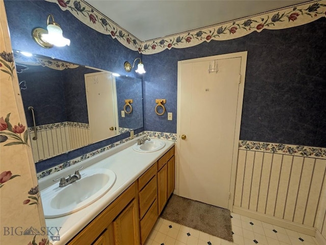 944 Placer, Butte, MT 59701 - bathroom featuring double vanity and wallpapered walls