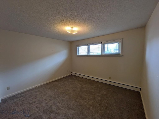 944 Placer, Butte, MT 59701 - carpeted empty room featuring baseboard heating and a textured ceiling
