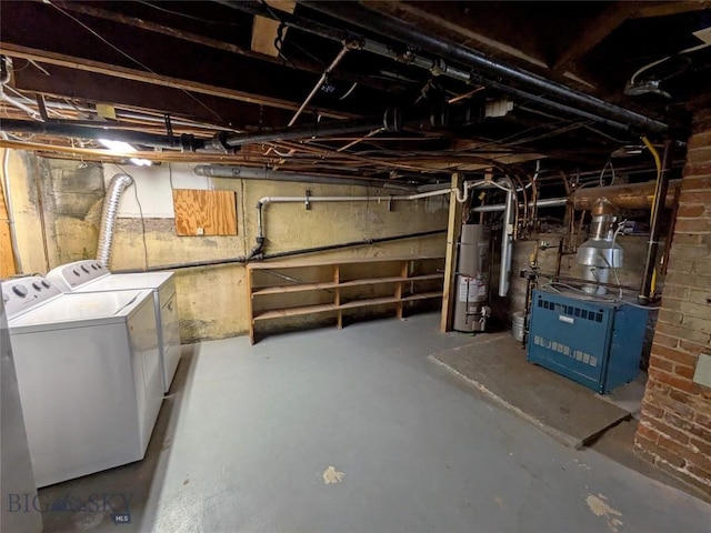 944 Placer, Butte, MT 59701 - unfinished below grade area with water heater, washer and dryer, and a heating unit