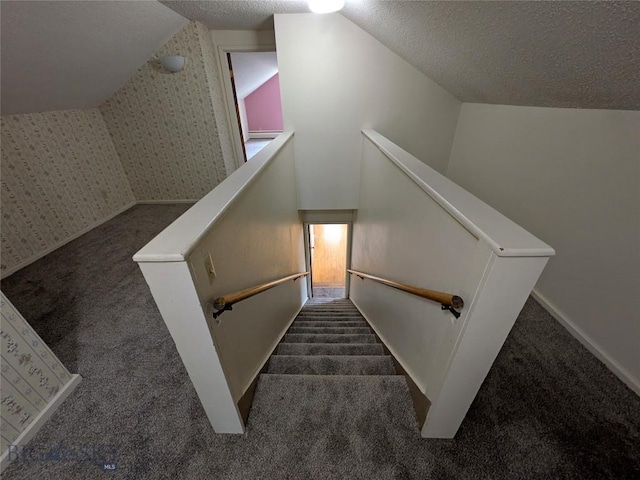 944 Placer, Butte, MT 59701 - stairs featuring carpet, lofted ceiling, and a textured ceiling