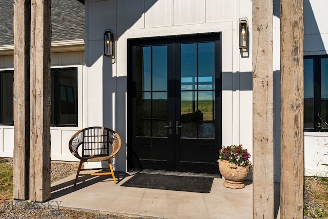 120 Horseshoe Loop, Harrison, MT 59735 - doorway to property with french doors and a shingled roof