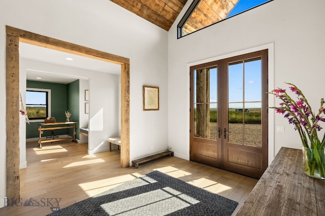 120 Horseshoe Loop, Harrison, MT 59735 - entryway featuring french doors, light wood-style floors, lofted ceiling, wood ceiling, and recessed lighting