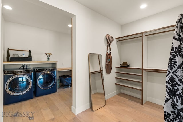 120 Horseshoe Loop, Harrison, MT 59735 - laundry area featuring washing machine and dryer, hardwood / wood-style flooring, and recessed lighting