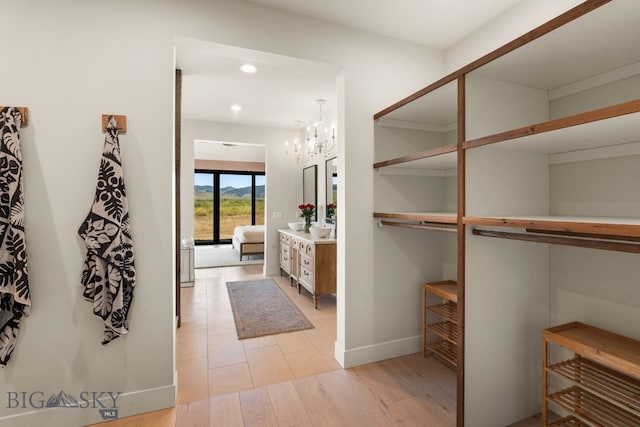 120 Horseshoe Loop, Harrison, MT 59735 - bathroom with a chandelier, recessed lighting, and vanity