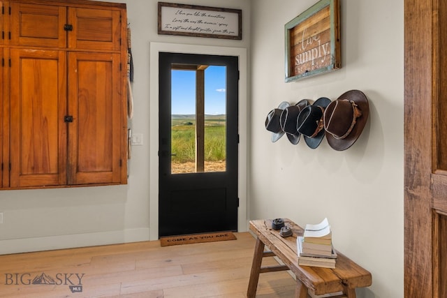 120 Horseshoe Loop, Harrison, MT 59735 - entryway featuring light wood finished floors and baseboards