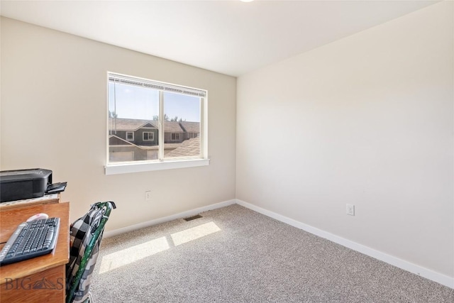 160 Tail Feather Ln Unit D, Bozeman, MT 59718 - unfurnished office featuring carpet and baseboards