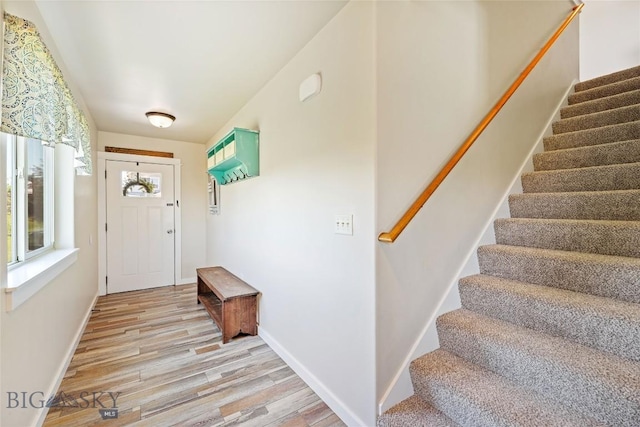 160 Tail Feather Ln Unit D, Bozeman, MT 59718 - entryway featuring stairway and light wood finished floors