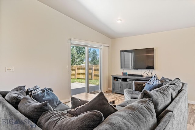 160 Tail Feather Ln Unit D, Bozeman, MT 59718 - living room featuring vaulted ceiling and light wood-style flooring