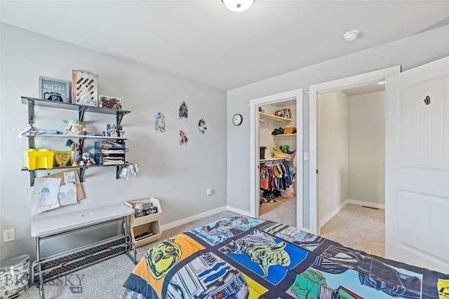 160 Tail Feather Ln Unit D, Bozeman, MT 59718 - bedroom featuring carpet floors and a walk in closet
