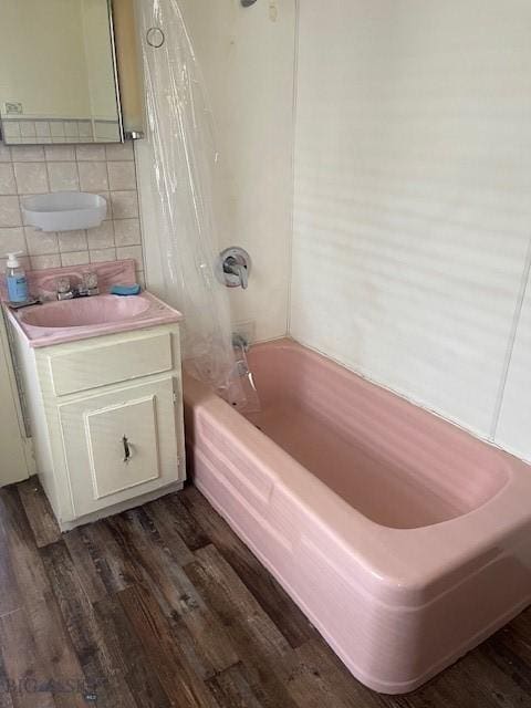 619 Daly St W, Walkerville, MT 59701 - bathroom featuring wood finished floors, vanity, and  shower combination
