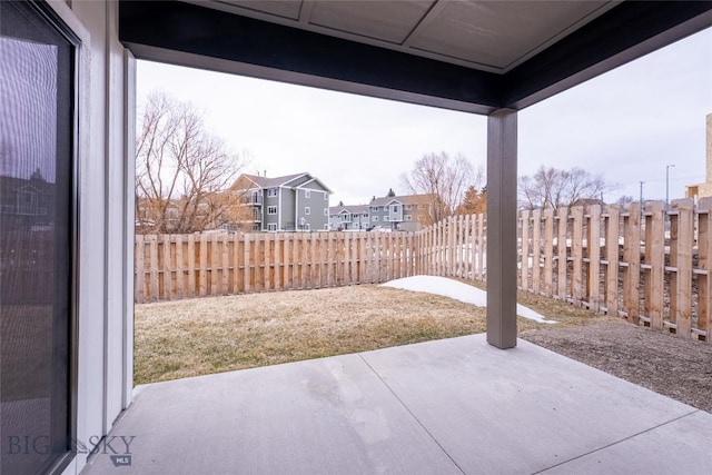 740 Rogers Way Unit B, Bozeman, MT 59718 - fenced backyard with a patio area and a residential view